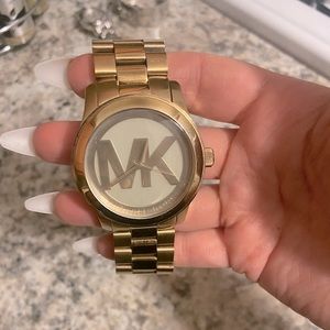 Unisex gold Michael kors watch